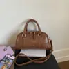 2025 Bolsa Satchel Texturizada de Moda Nicho Retrô Bolsa Almofada 2025 Nova Bolsa Simples de Cor Pura para Comutador com Alça Única Transversal