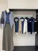 Cárdigan de punto patchwork de mezclilla con solapa para mujer, nuevo estilo primavera/otoño 2026, top de imitación de dos piezas, chaqueta suéter holgada y elegante