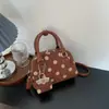 Bolsa de poá nicho estilosa e moderna Shuai Mi Jia para mulheres, nova bolsa transversal para o dia a dia outono 2026, bolsa de mão, bolsa almofada