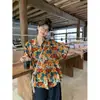 Camisa de Seda de Gelo de Verão 2026 para Mulheres, Estampa Floral Estilo Francês, Gola Reversível, Manga Curta, Caimento Solto, Emagrecedor, Top Casual Jacquard