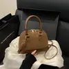 Bolso vintage transfronterizo para mujer 2026 nuevo moda europea y americana estampado de leopardo bolso de mano versátil de gran capacidad tipo concha para mujer