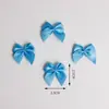Al por mayor Lazos de Cinta de 3 Puntos Moños de Cinta DIY Flores Pequeñas Accesorios para Ropa Interior Ropa Piezas Decorativas Hecho a Mano