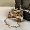 Bolsa de boca de clip terminada transfronteriza nueva 2025 estilo étnico moda bolsa cheongsam hermoso bolso de mano atmosférico bolso de hombro único cruzado