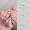 Nuevas Pegatinas para Uñas con Moño de Cinta al por Mayor Estampadas Tridimensionales Blanco Puro Estilo Dulce Decoraciones de Pegatinas para Uñas Usables