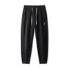 Pantalones casuales para hombre para otoño e invierno, corte holgado, versátiles, estilo deportivo, con puños elásticos