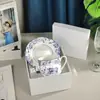 Taza y platillo de porcelana de hueso estilo europeo transfronterizo Serie Tigre Ruyi Juego para el hogar Taza de café y platillo Caja de regalo creativa para café de la tarde