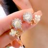 Pendientes de lujo ligeros de nicho de alta gama con forma de ojo de gato y flor, pendientes de circonita exquisitos y superllamativos para mujer, joyería para la misma oreja de celebridades de Internet
