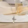 Colar de Trevo de Quatro Folhas Estilo Ins da Moda, Microincrustado com Flor Pequena, Corrente para Clavícula que Não Desbota, Luxo Leve Atacado