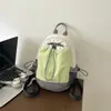 2026 Verano Nuevo Estilo Inspirado en el Bosque Moderno Color Sólido Bloque de Color Correa para el Hombro Ligero Mochila Versátil para Viajes Cortos y Paseos