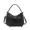 Bolso de mujer con diseño de nicho único 2026 nuevo bolso cruzado versátil bolso de mano exquisito bolso de mano de moda super popular