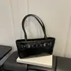 Comércio Exterior Deslocamento Transfronteiriço Grande Capacidade 2026 Nova Fivela de Cinto Moda Casual Motocicleta Bolsa de Ombro Único Baguete Bolsa de Axila