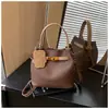 Bolso Retro de Nicho para Mujer 2026 Nuevo de Moda Casual Versátil Bolso Cubo para Viajar Simple Cruzado Bolso Madre-Hija