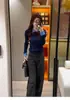 Suéter de Tricô Falso Duas Peças em Cor Contrastante para Mulheres 2025 Novo Outono e Inverno Camisa Slim para Camadas Internas Cinza com Gola Polo