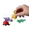 Adornos Pequeños Divertidos de Escritorio para Aliviar el Estrés Regalo Juguetes Articulados de Animales para el Pulgar Figuras Móviles Transfronterizos 529