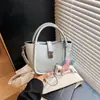 Bolso Cubo para Mujer con Acabado de Alta Gama, Bolso de Mano Transfronterizo de Moda con Patrón de Lichi, Nuevo Bolso Cruzado Estilo Cesta Elegante 2026