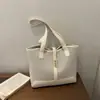 Bolso de retazos de moda para mujer, nuevo estilo 2026, elegante y de gran capacidad, versátil para ir al trabajo, bolso de hombro y bolso de mano, adecuado para ventas transfronterizas