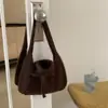 Nuevo bolso tote casual 2026 para el uso diario, estilo coreano, bolso de mano de punto chic y versátil