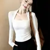 Camiseta de manga larga ajustada con cuello cuadrado acanalado de seda de hielo Wubi para mujer, una prenda interior básica con un diseño puro y seductor que revela la clavícula.
