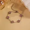 Pulsera Popular Transfronteriza de Diamante con Forma de Trébol de Cuatro Hojas Acero Inoxidable Lujo Ligero Moda de Gama Alta Doble Cara Joyería de Nácar Venta al por Mayor