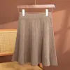 Saia plissada de malha 100% lã, novo estilo de primavera, cintura alta moderna que afina, versão coreana, saia simples e versátil