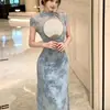 Nuevo vestido cheongsam de verano 2026, retro chic y elegante, estampado, con calados, corte ajustado, estilo chino, largo