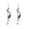 Pendientes largos de estilo coreano, negros, con flecos de perlas en espiral con efecto de goteo de aceite, únicos y versátiles, efecto adelgazante, pendientes de otoño e invierno