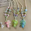 Collar con colgante de campana de mariposa de cerámica de estilo étnico retro para mujer, diseño nuevo y moderno, cadena larga para suéter, accesorios