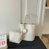 Bolsas Pequenas Femininas Modernas e Tendência 2026 Novo Estilo de Verão Versátil Bolsa Transversal com Toque de Luxo e Bolsa de Mão Bolsa Saco