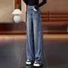 Jeans vintage largo feito sob medida para mulheres, cintura alta, com caimento fluido, design reto solto, comprimento até o chão, emagrecedor e versátil