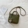 Bolso tipo cubo de diseño nicho transfronterizo para mujer, nuevo y moderno 2026, versátil bolso de hombro y cruzado con textura de alta calidad