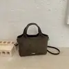 Bolsa de cubo de moda retro de alta gama 2026 transfronteriza, bolso de mano versátil casual, bolso de hombro, bolso cruzado