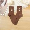 Calcetines mujer Primavera y Otoño color liso clásico letra tendencia calcetines altos zapatos de cuero pequeños zapatillas calcetines versátiles venta al por mayor