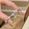 Pulsera de Copo de Nieve y Trébol de Cuatro Hojas Retro de Lujo Ligero Incrustada con Circonita Lujo de Industria Pesada Moda Exquisita Temperamento Exquisito Pulsera de Gama Alta