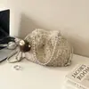 Bolso de felpa de lana de cordero retro de nicho para mujer, nuevo bolso tipo cubo versátil otoño/invierno 2026, bolso peludo súper moderno