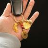Llavero con colgante de bolsa de dinero del zodiaco de latón, para llaves de coche de hombre y mujer.