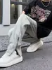 Jeans de hombre de estilo retro americano transfronterizo, corte holgado, lavados, con cremalleras laterales, vibra de moda, pantalones vaqueros largos únicos y modernos