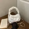 Bolsa Plissada Nova Primavera 2026 Bolsa de Ombro com Corrente Fashionable Bolsa de Mão Tipo Balde Única Bolsa Transversal Tendência