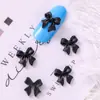 Al por mayor Mariposa de Punta de Dedo Escarchada Popular Lazo Estampado Diamante de Manicura Lazo de Resina Lazo de Corbata Streamer de Temu Diamante Decorativo 3D