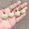 Venta al por mayor de fábrica jade afgano natural jade blanco azul candado ruyi colgante de jade estudio candado Xiangyun colgante de jade colgante