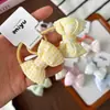 Goma para el pelo de tela dulce estilo coreano para niños, diadema versátil para niñas con estampado floral y de cuadros, con lazo de algodón tridimensional