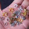 Aleación de plata de Xizang soporte de flor de corona sombrero cuentas sueltas cuentas de plata con agujero grande variedad de corona colgante pequeño cuentas para pulsera