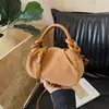 2026 nova bolsa plissada super popular estilo nuvem feminina moda bolsa de mão retrô bolsa de ombro transversal versátil moderna
