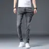 Jeans de Algodão Stretch Preto e Cinza Slim Fit Masculino Hong Kong Primavera e Outono, Calça Casual Elástica de Alta Qualidade Estilo Coreano para Outono
