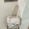 Bolsa de bolos versátil de gran capacidad para mujer, nuevo bolso de hombro de moda 2026 con estampado de leopardo, bolso tote de nicho estilo coreano para el día a día