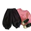 Pantalones casuales para niños estilo coreano, nueva colección otoño 2026, pantalones de tobillo cónico, corte holgado, pantalones largos versátiles para bebés