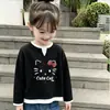 2026 Primavera y Otoño Nuevo de Moda para Niñas Elegante de Manga Larga Ropa Interior Infantil Falso Dos Piezas Tejido Waffle Superior Camiseta Casual
