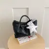 Bolsa de palha tecida de nicho transfronteiriça 2026 nova moda feminina bolsa de cesta simples bolsa de ombro crossbody