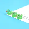 Muñeco de pato de dibujos animados amarillo luminoso adornos pequeños micro paisajismo resina joyería creativa manualidades accesorios