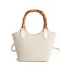 Nova bolsa de mão feminina estilosa e elegante 2026, bolsa tote tipo balde fashion, bolsa de palha feminina da moda, bolsa transversal