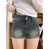 Shorts de mezclilla retro de cintura alta para mujer, nuevo estilo verano 2026, look vintage americano adelgazante, hot pants sexys de línea A que se ajustan a la cadera